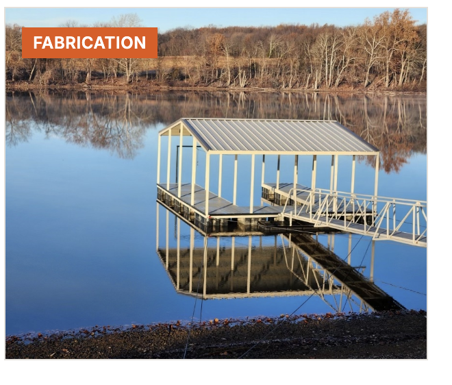 Custom white steel boat dock fabricated and installed on calm Oklahoma lake